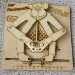 Calculadora Mecánica Mono Matemático - Proyecto de Corte Láser para Aprendizaje Interactivo