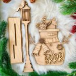 Archivo SVG de corte láser de muñeco de nieve y copo de nieve para decoración navideña Glowforge