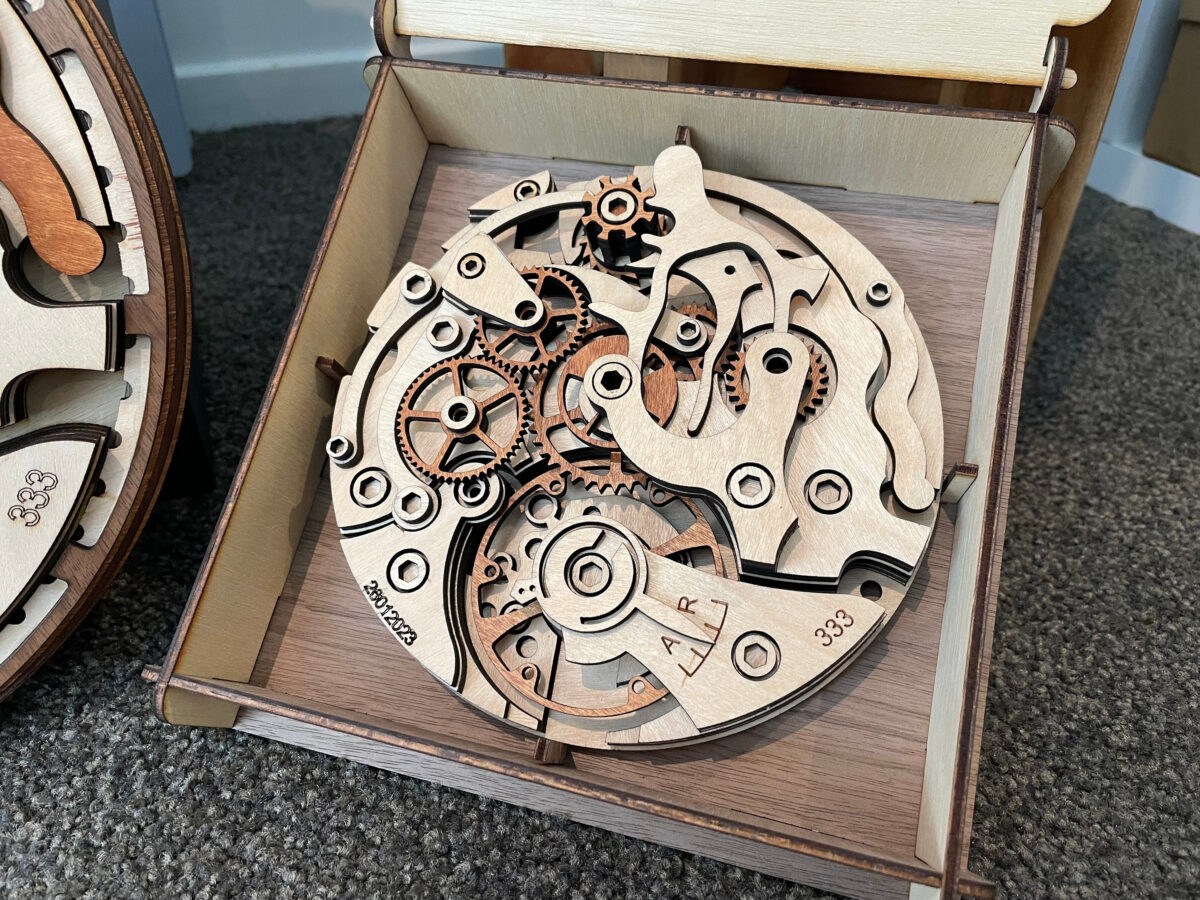 il_fullxfull.6102386484_rxc2.jpg Movimiento de reloj mecánico 3D multicapa para corte láser - Archivos SVG, AI, DXF y Lightburn - Imagen 1